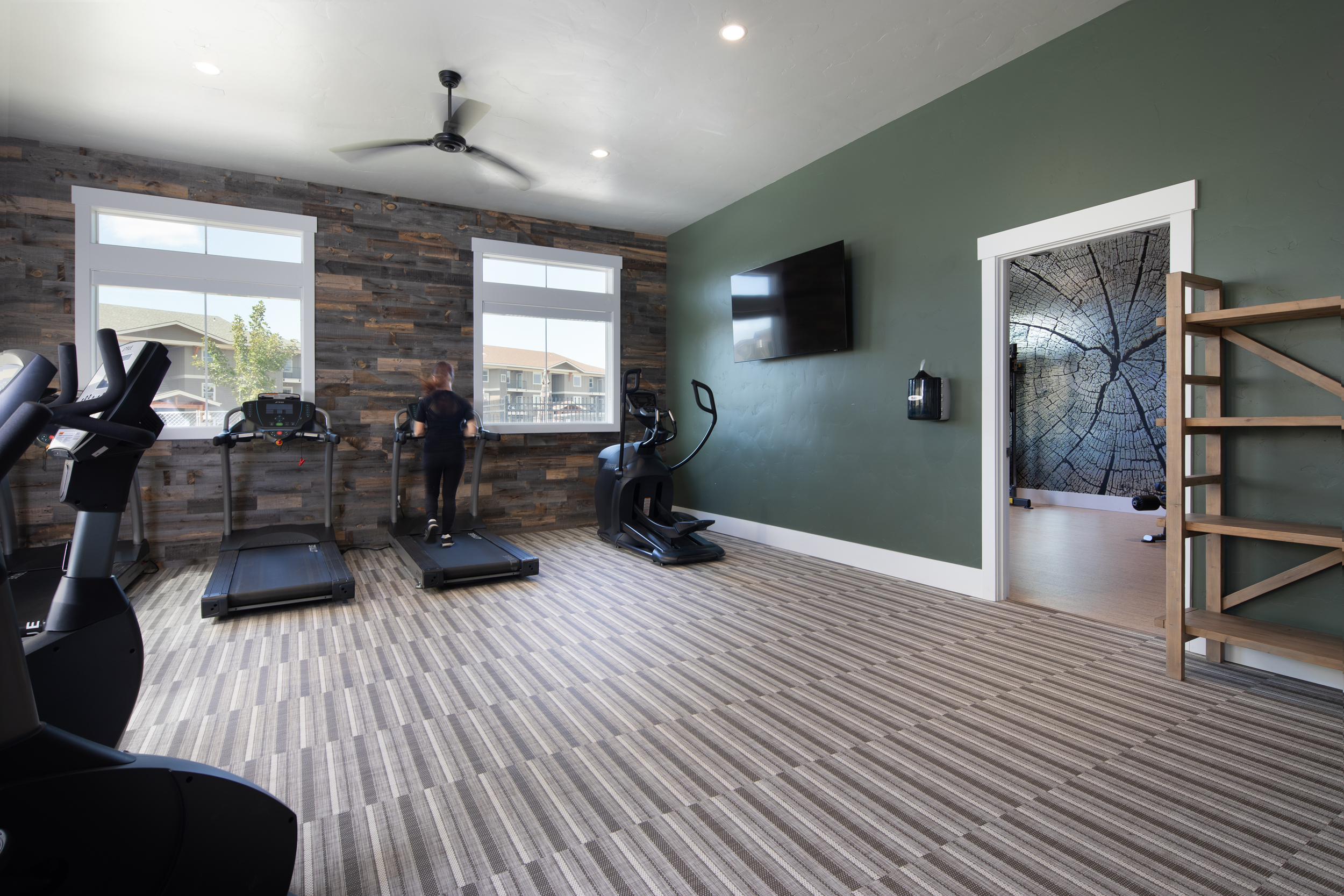 Indoor gym with ellipticals